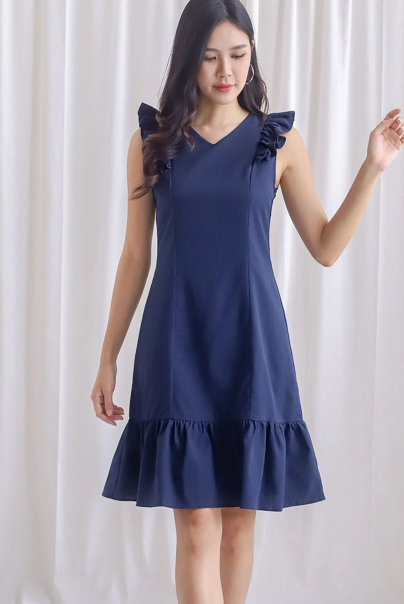 Acacia Flutter Sleeve Dress In Navy Blue