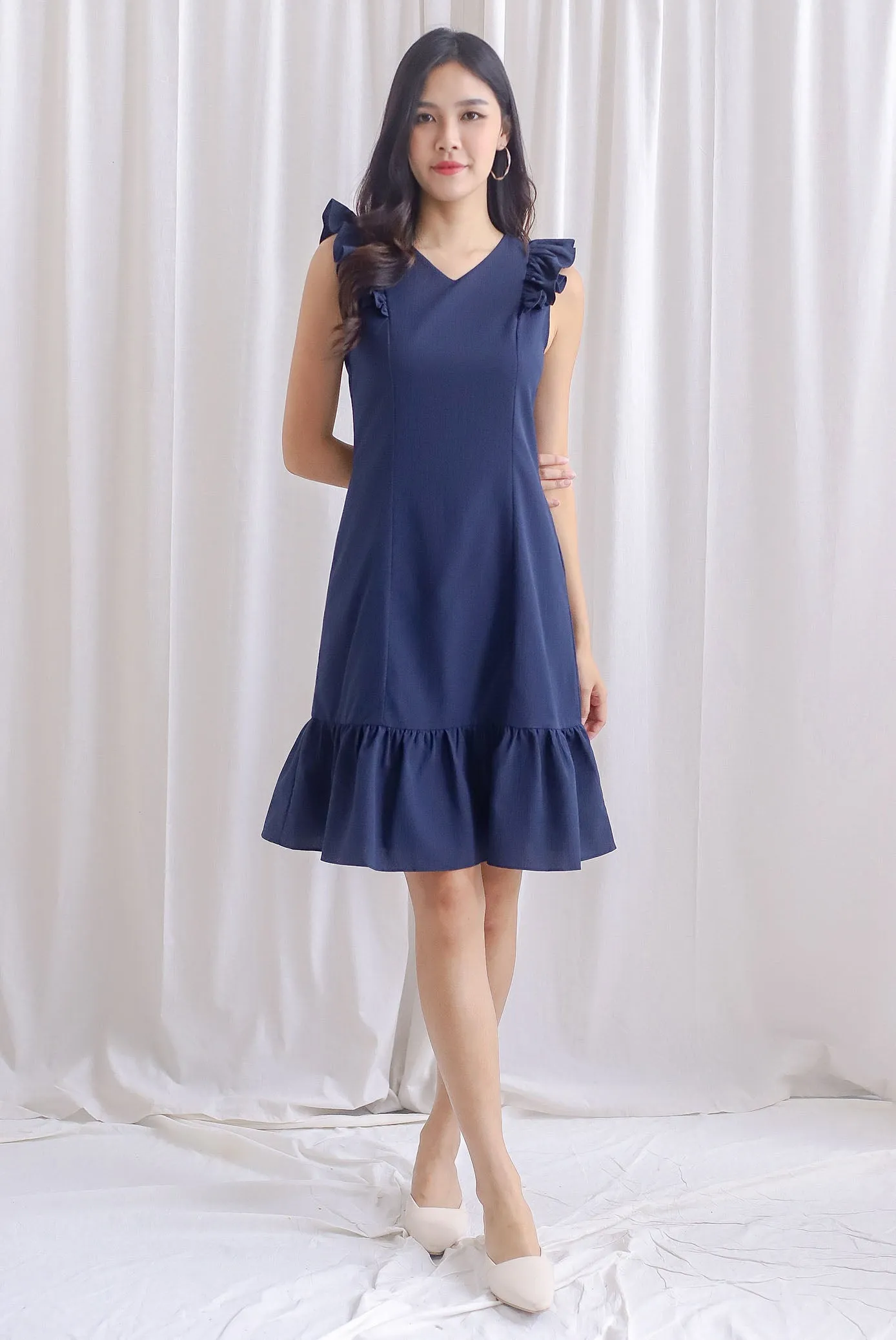 Acacia Flutter Sleeve Dress In Navy Blue