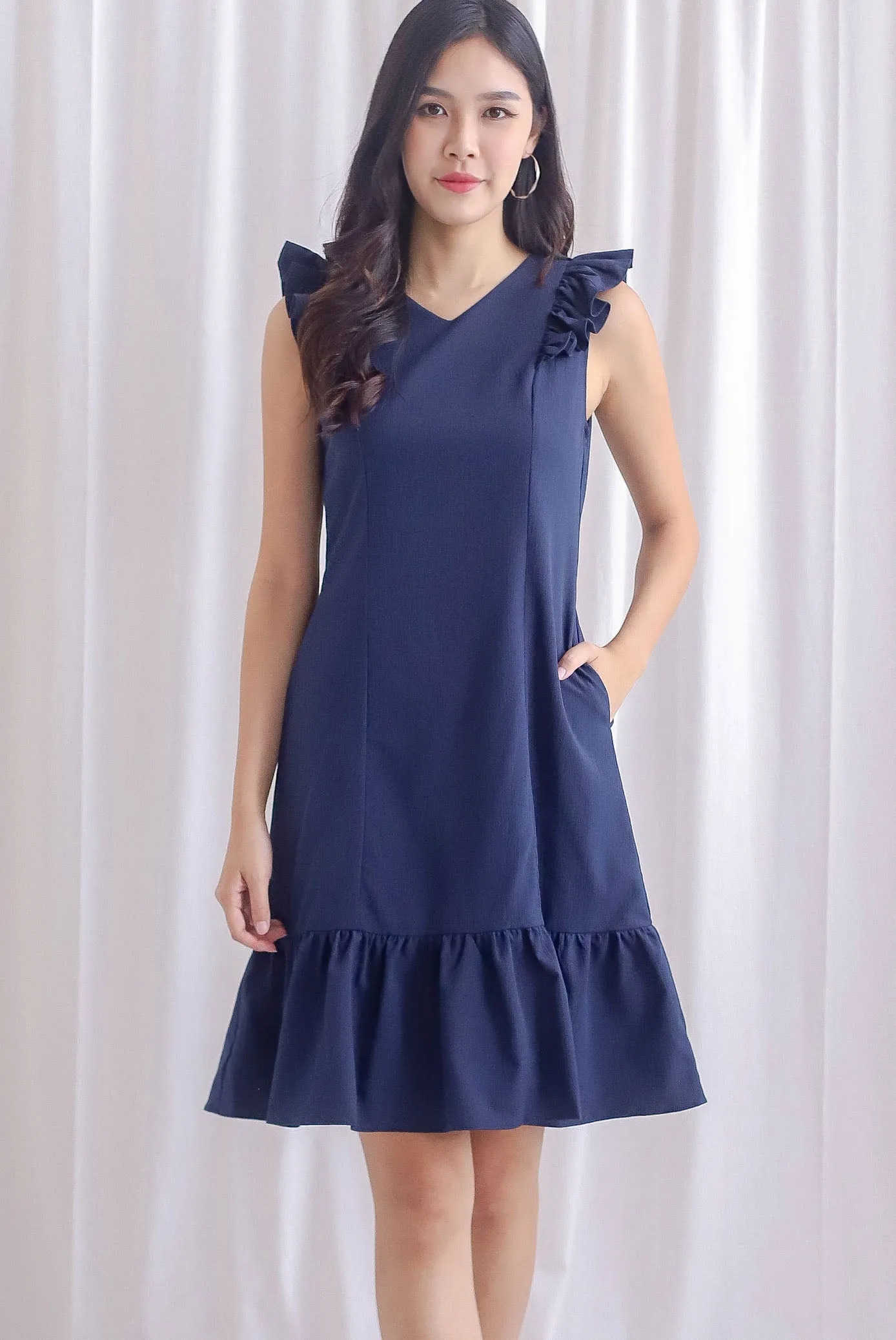 Acacia Flutter Sleeve Dress In Navy Blue