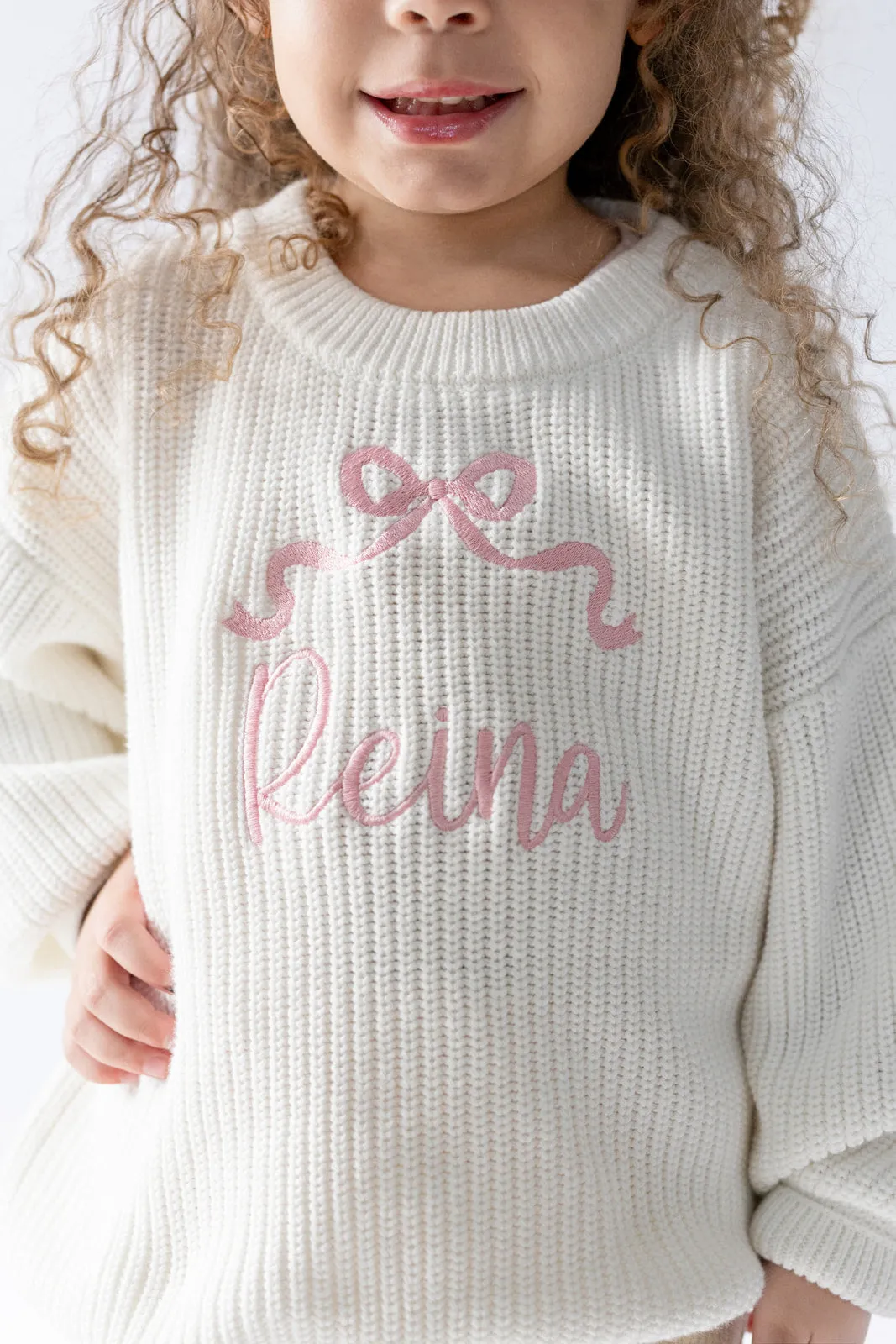 BOW EMBROIDERED SWEATER
