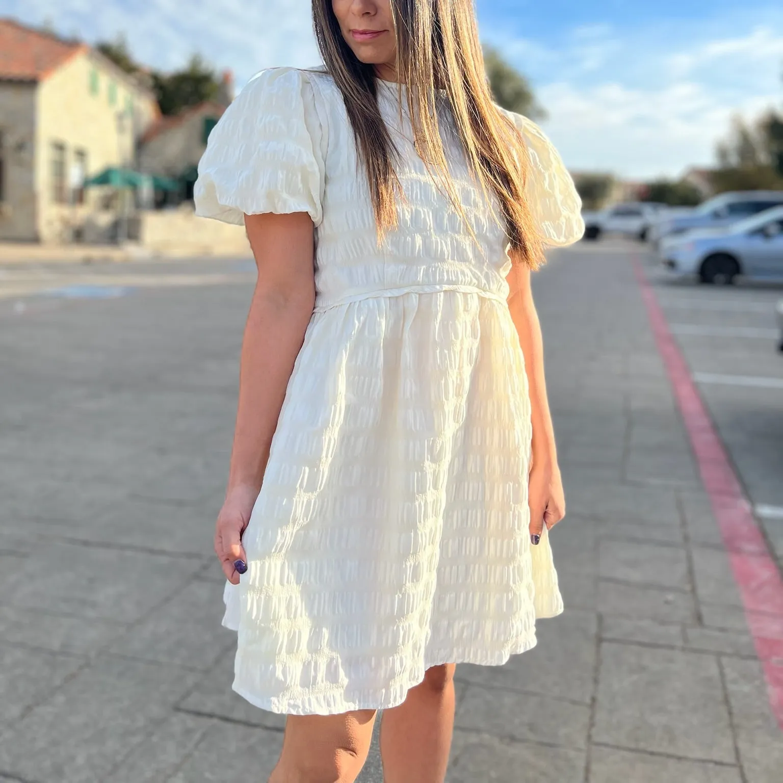 Ellora Textured Babydoll Mini Dress