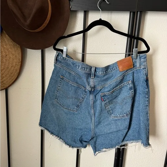 Levi’s medium blue distressed 501 denim jean shorts retro vintage cut offs