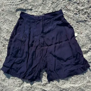 Norma Kamali vintage 1980s Purple shorts.  Very small
