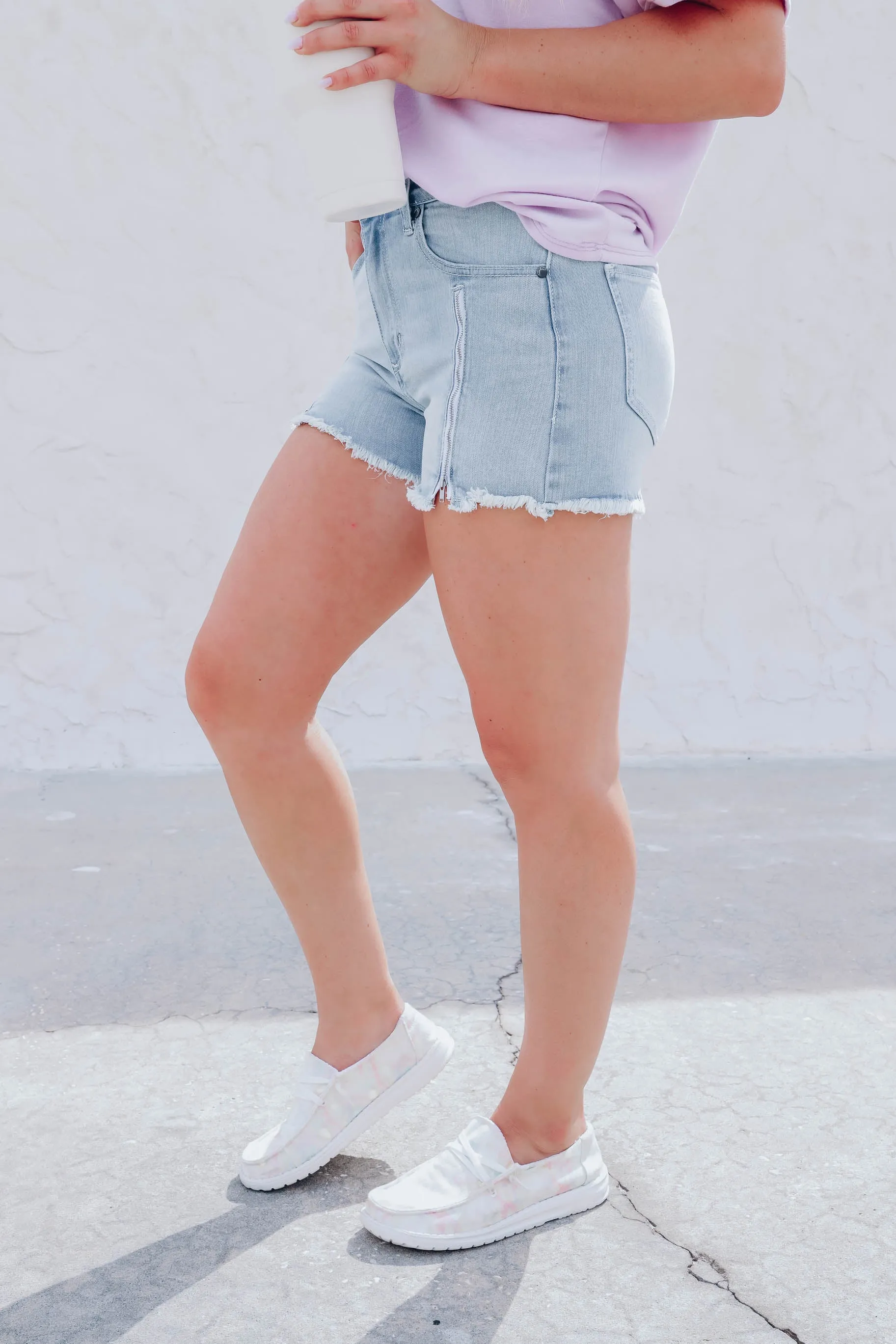 Zipped Down Light Wash Denim Shorts