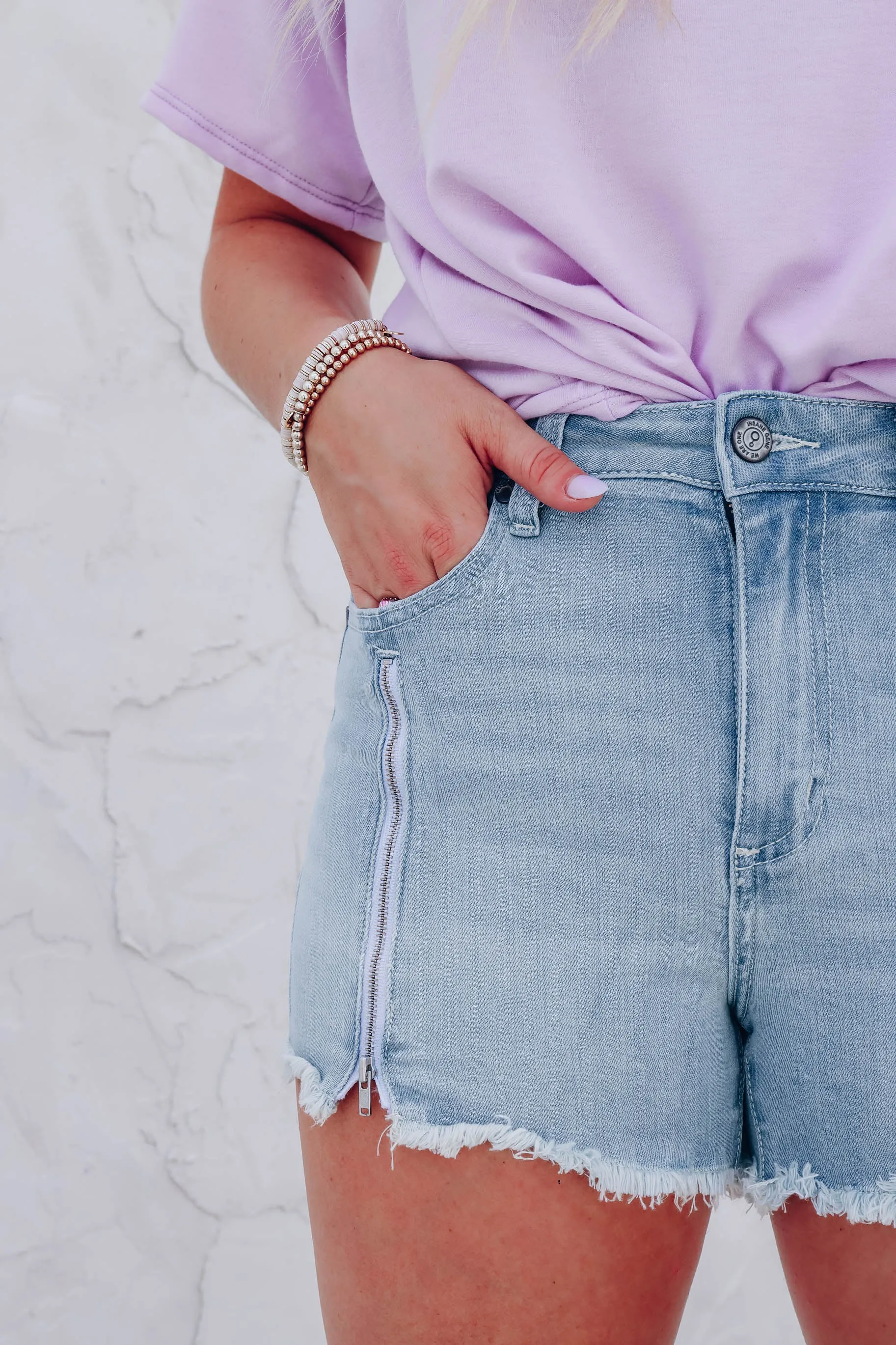 Zipped Down Light Wash Denim Shorts