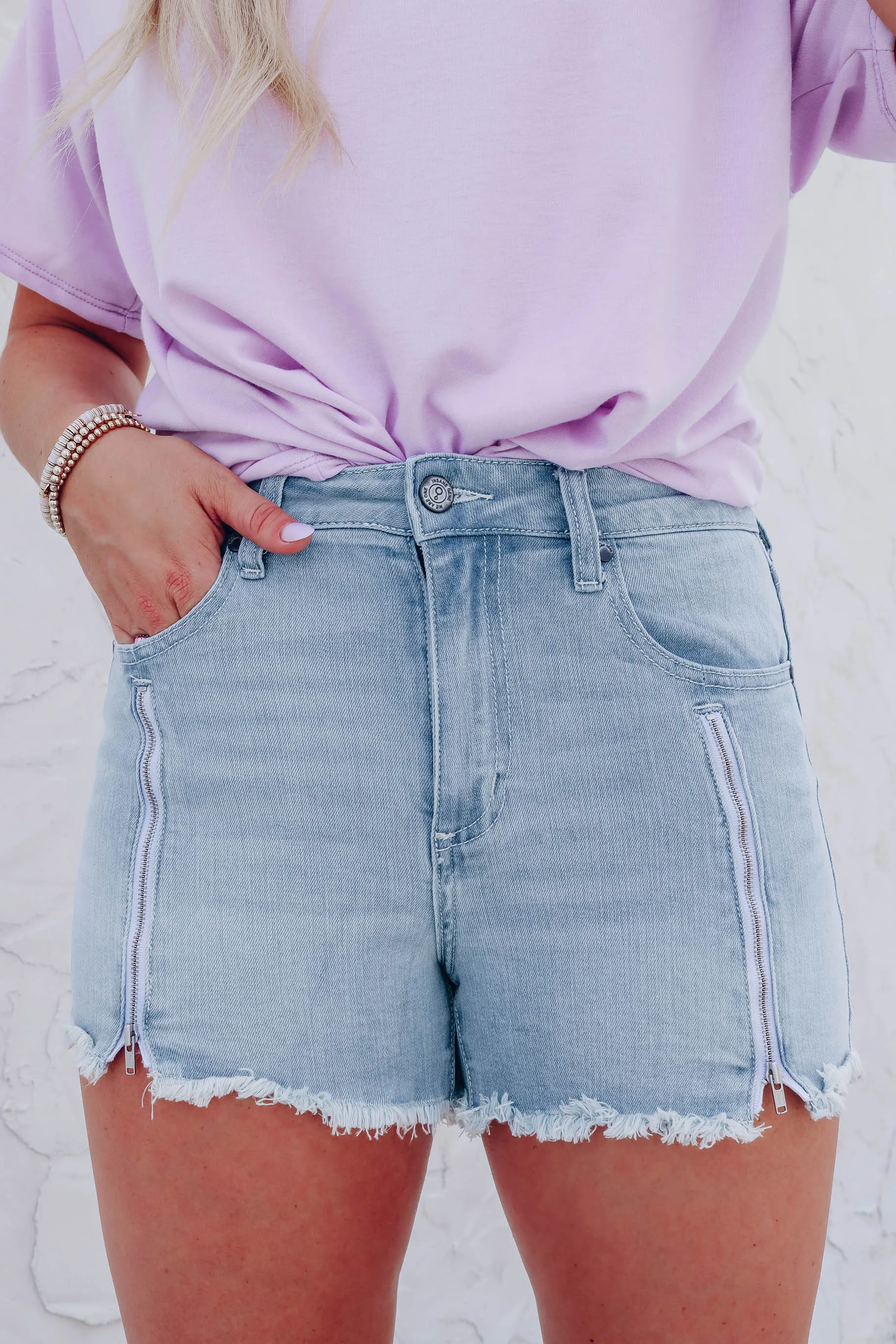 Zipped Down Light Wash Denim Shorts