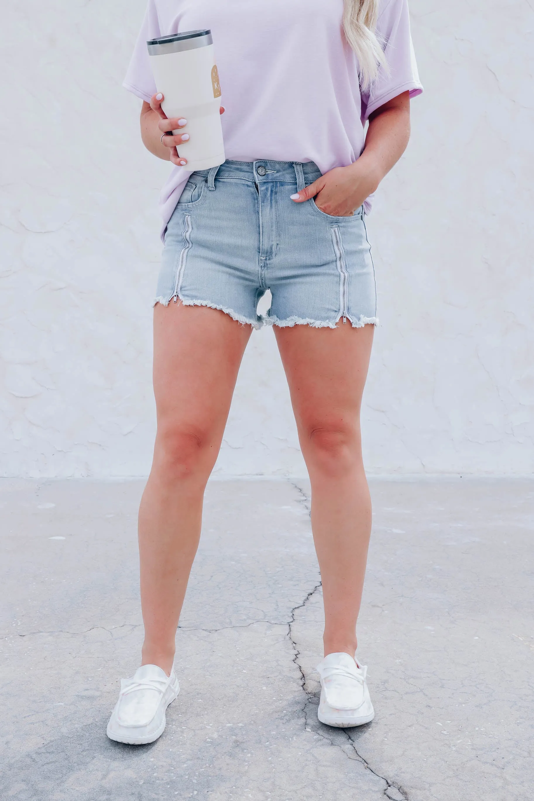 Zipped Down Light Wash Denim Shorts